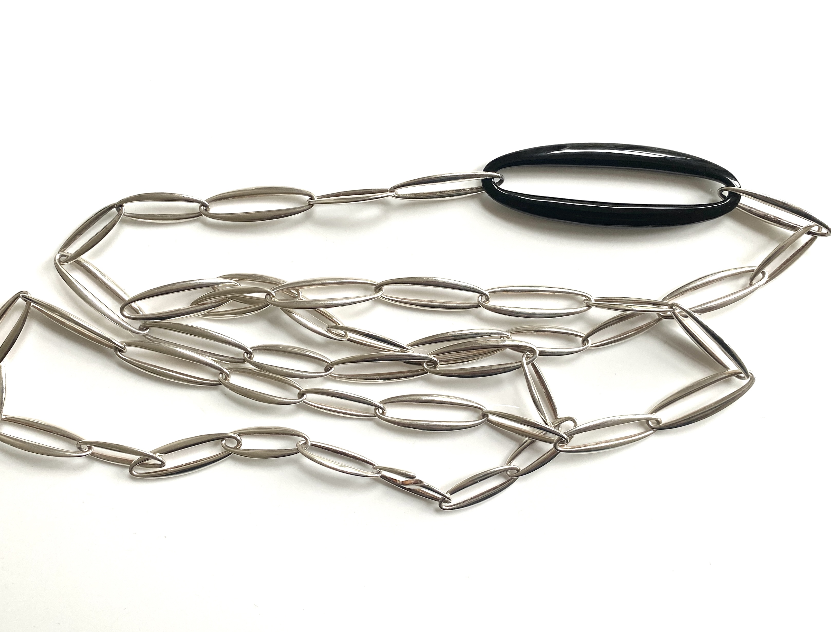 Shop the exquisite Regitz Overgaard Georg Jensen Zephyr Silver Necklace. This stunning piece features delicate craftsmanship, showcasing timeless elegance and sophistication perfect for any occasion.